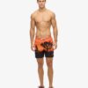 Fotografiska 17-tums återvunna badshorts