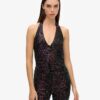 Halter-jumpsuit med paljetter Halter-jumpsuit med paljetter