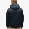 Hooded Stormhybridjacka i stickat med huva Hooded Stormhybridjacka i stickat med huva