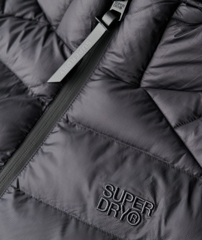 Hooded Stormhybridjacka i stickat med huva Hooded Stormhybridjacka i stickat med huva