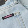 Jeans med vid ben och rå kant