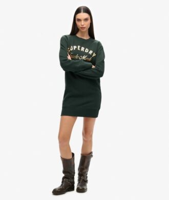 Jerseyklänning med lyxigt metalliskt logo