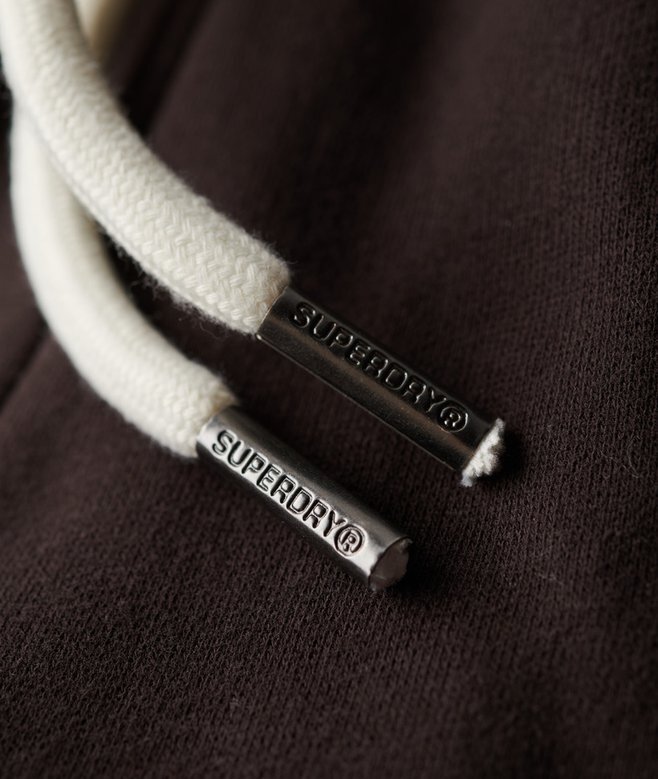 Joggerbyxor med låg midja och utsvängda ben med neonfärgat Vintage-logo Joggerbyxor med låg midja och utsvängda ben med neonfärgat Vintage-logo