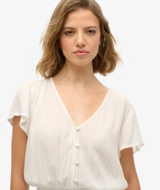 Kortärmad playsuit med tryck Kortärmad playsuit med tryck
