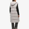 Lång hooded väst med vaddering Lång hooded väst med vaddering