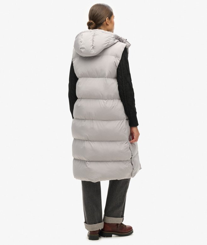 Lång hooded väst med vaddering Lång hooded väst med vaddering