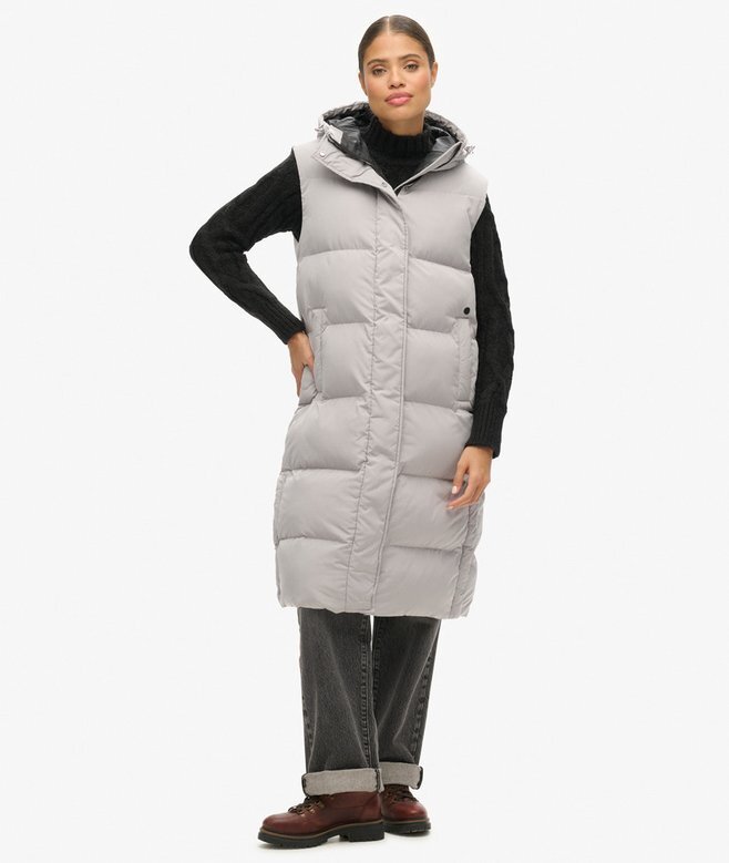 Lång hooded väst med vaddering Lång hooded väst med vaddering