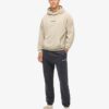 Löst sittande hoodie med mikro-logotyp