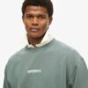Löst sittande Sweatshirt med mikro-logotyp Löst sittande Sweatshirt med mikro-logotyp