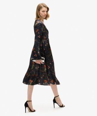Midi-klänning i jacquard med utsvängda ärmar