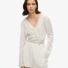 Playsuit med utskurna ärmar