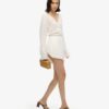 Playsuit med utskurna ärmar