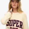 Slapp stickad tröja med tryck