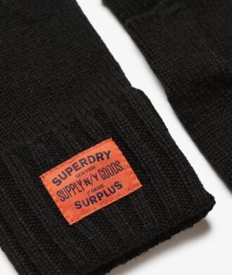 Stickade handskar i arbetskläder Stickade handskar i arbetskläder