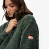 Supermjuk teddyfleece med tryckknappar i halsen