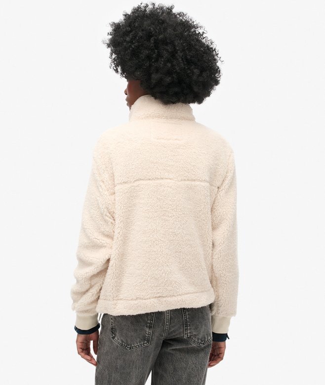 Supermjuk teddyfleece med tryckknappar i halsen Supermjuk teddyfleece med tryckknappar i halsen