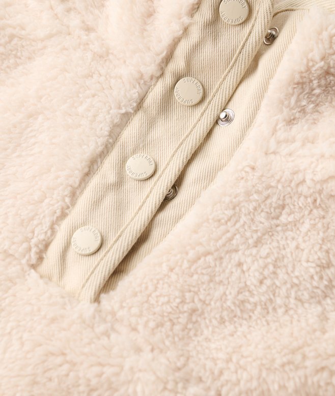 Supermjuk teddyfleece med tryckknappar i halsen Supermjuk teddyfleece med tryckknappar i halsen