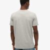 T-shirt med grafiskt tryck på bröstet och kopparetikett T-shirt med grafiskt tryck på bröstet och kopparetikett