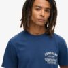 T-shirt med grafiskt tryck på bröstet och kopparetikett T-shirt med grafiskt tryck på bröstet och kopparetikett