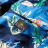 Återvunna hawaiimönstrade shorts, 17 tum
