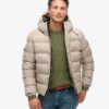 Tweed-sportjacka med huva som puffar Tweed-sportjacka med huva som puffar