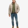 Tweed-sportjacka med huva som puffar Tweed-sportjacka med huva som puffar