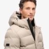 Tweed-sportjacka med huva som puffar Tweed-sportjacka med huva som puffar
