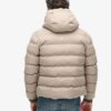 Tweed-sportjacka med huva som puffar Tweed-sportjacka med huva som puffar
