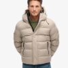 Tweed-sportjacka med huva som puffar Tweed-sportjacka med huva som puffar