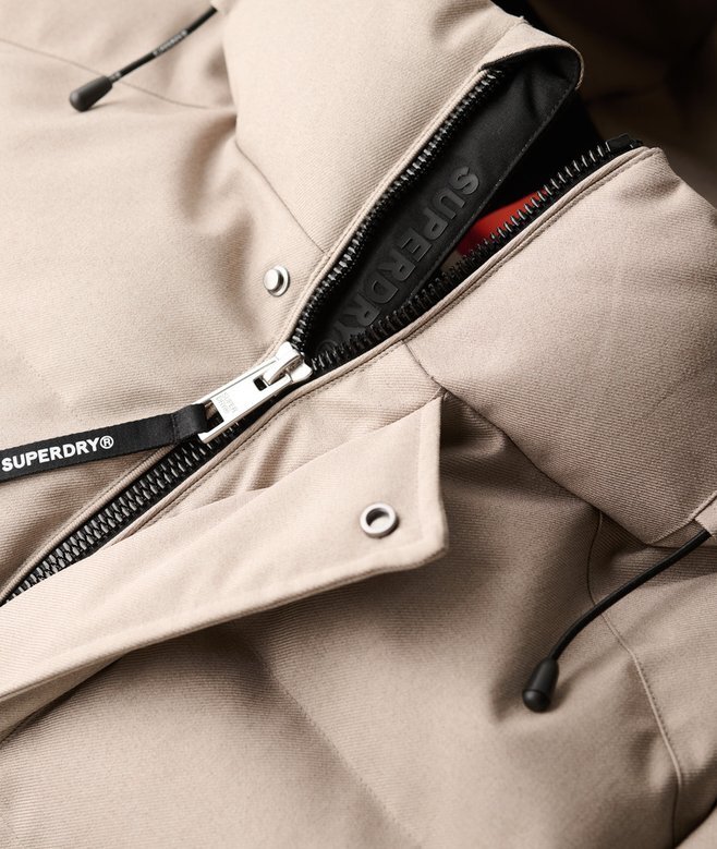 Tweed-sportjacka med huva som puffar Tweed-sportjacka med huva som puffar